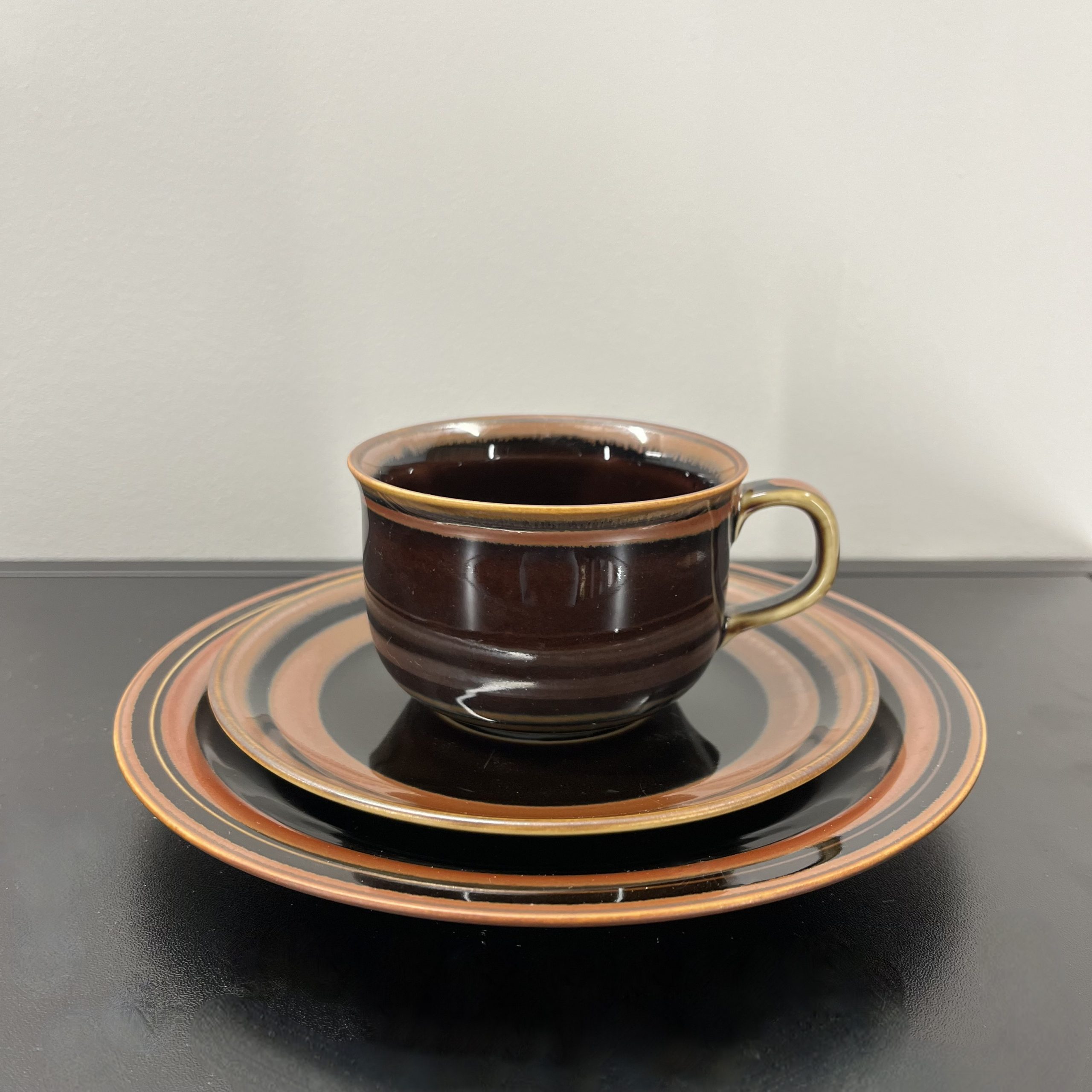 A set of 4 "Viking" Teacups with Saucers and Plates