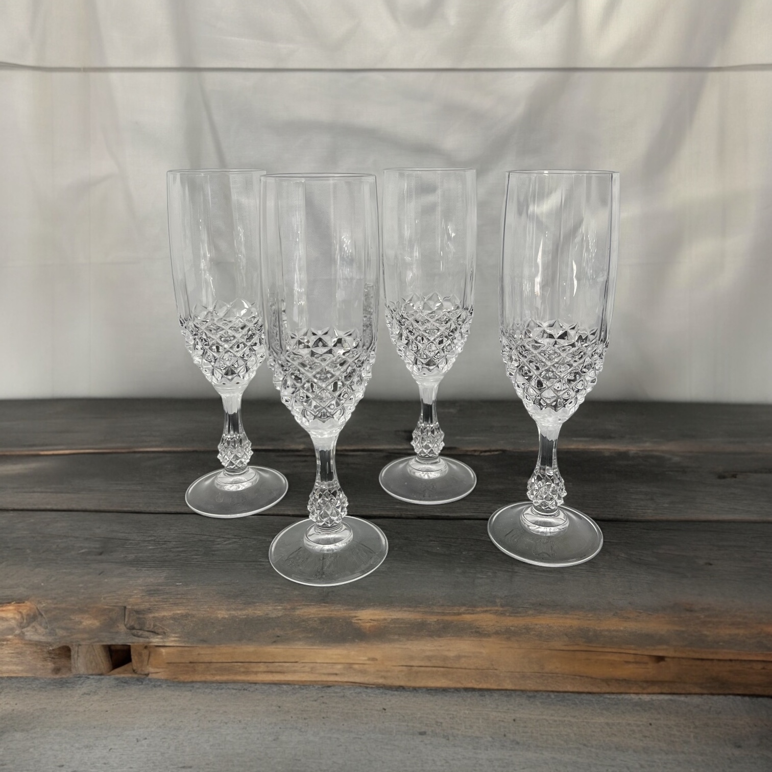 A Set of 4 Crystal Champagne Glasses